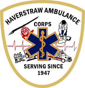 The image shows the Haverstraw Ambulance Corps logo. It features a shield shape with a blue star of life and Rod of Asclepius in the center. Surrounding images depict emergency medical responses, an ambulance, and a heartbeat waveform. Text reads “Serving Since 1947.